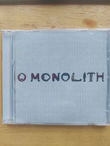 Обложка альбома «O Monolith» — исполнитель SQUID