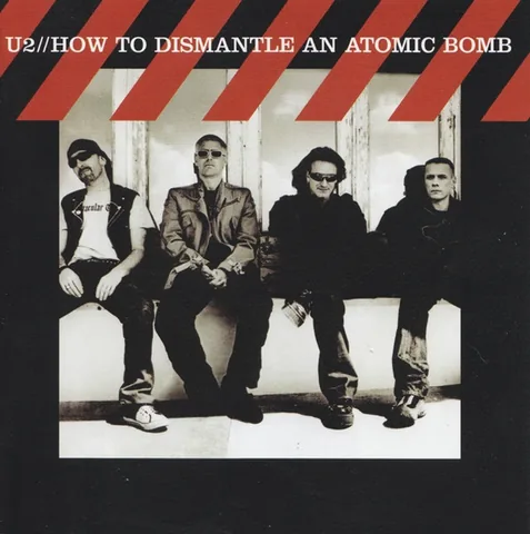 Обложка альбома «How To Dismantle An Atomic Bomb» — исполнитель U2