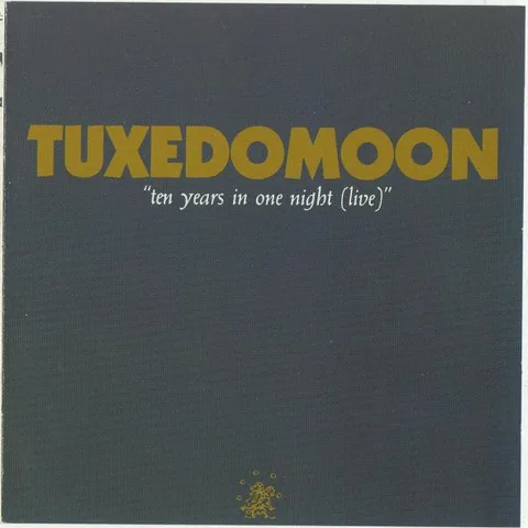 Обложка альбома «Ten Years In One Night (Live)» — исполнитель TUXEDOMOON