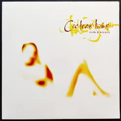 Обложка альбома «Milk & Kisses» — COCTEAU TWINS