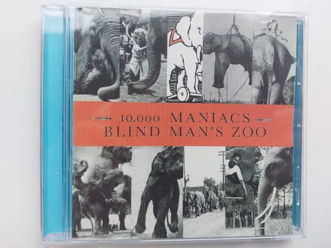 Обложка альбома «Blind Man's Zoo» — исполнитель 10 000 Maniacs